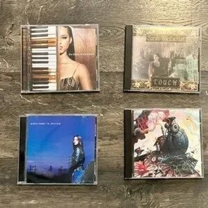 Set of Four Music CDs
